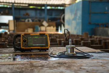 Ultrasonic test to detect imperfection or defect of steel plate in Workshop, NDT Inspection.