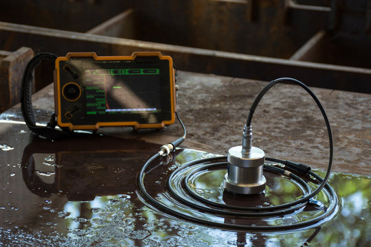 Ultrasonic test to detect imperfection or defect of steel plate in Workshop, NDT Inspection.