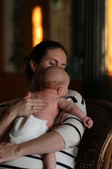 People: Mom holding baby