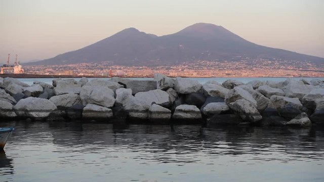 Sunset over Vesuvius in Naples and sea, Italy
