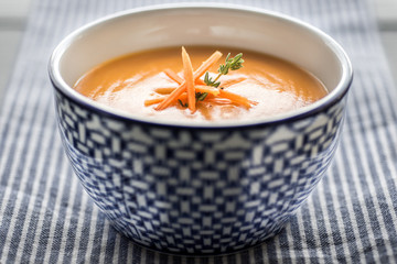 Carrot Soup Served in Bowl. Homemade Cream Carrot and Potato Pottage.