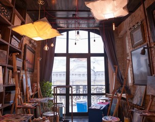 Beautiful empty artist's studio interior with large window