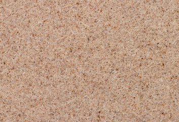 Brown plywood surface.