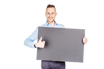 young man holding black blank panel with space for text on white background.