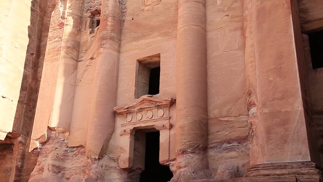 Facade of Urn Tomb of the Royal Tombs, ancient city of Petra - ancient historical and archaeological rock-cut city in Hashemite Kingdom of Jordan
