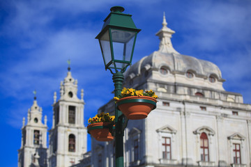Fototapeta na wymiar Typical metal street lamp at Mafra (Portugal)