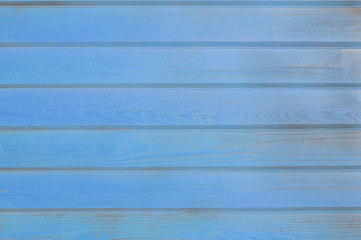 blue old wooden fence. wood palisade background. planks texture