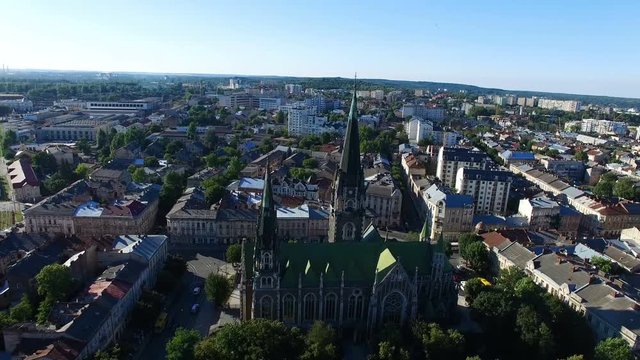 AERIAL flight around ancient church in Lviv. 4K