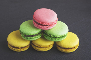 Several different colored macarons