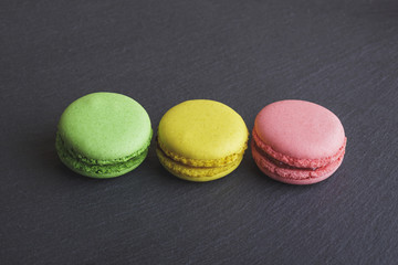Several different colored macarons