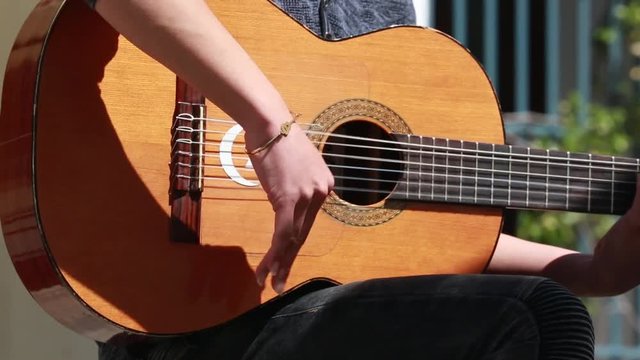 Closeup Of A Guitarist Playing A Flamenco Guitar - HD Video