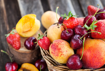 Naklejka na ściany i meble Fresh ripe summer berries and fruits