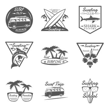 Set of surfing in monochrome style logos, emblems, labels and badges.