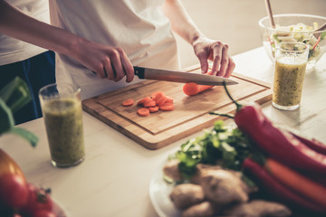 Couple cooking healthy food