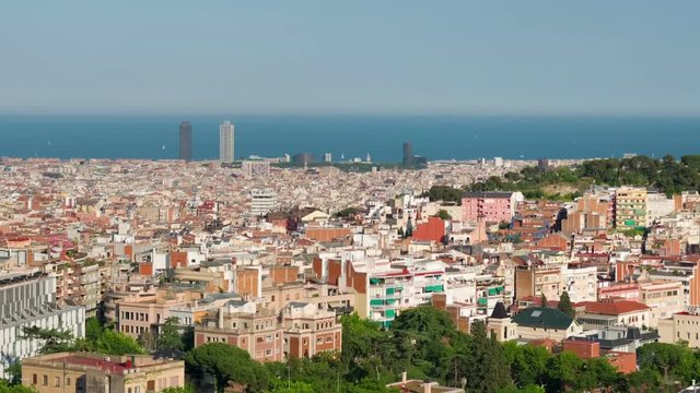 Panning to right timelapse of Barcelona in a summer day