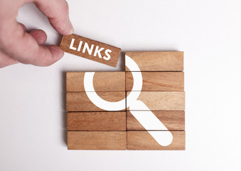 Business, Technology, Internet and network concept. Young businessman shows the word: Links