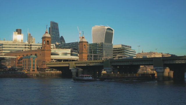 View to the City and London Bridge from Thames embankment.