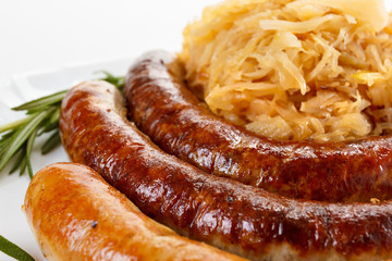 Oktoberfest menu, plate of sausages and sauerkraut