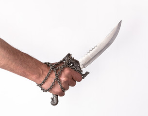 Hand with an ancient silver knife, killer, white background