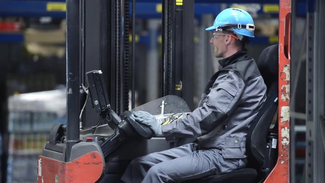 Warehouse Worker in the Forklift