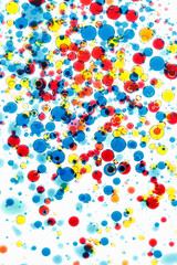 Abstract multicolor background. Bubbles of paint and ink on a white, pattern of drop.