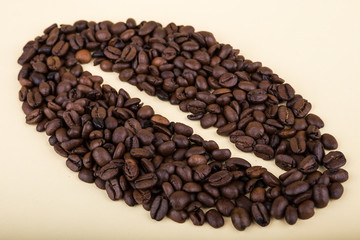 Coffee beans on  ylelow background