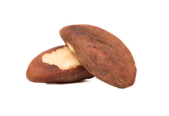 Two Brazil nuts isolated on white background