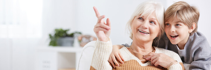Boy spending time with grandma