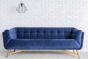 Blue sofa and fancy lamp