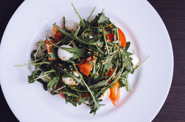 Fresh, summer salad with arugula leaves