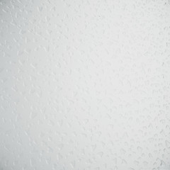 Obraz na płótnie Canvas Water droplets on frosted glass, close-up, realistic 3D rendering