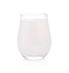 fresh milk in the glass on white background