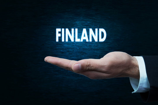 Hand holding Finland word