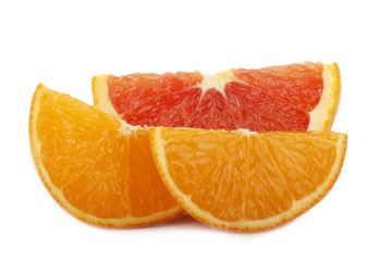 tangelo and red orange slices  isolated