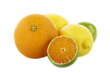 green tangerine slice and lemon isolated on white