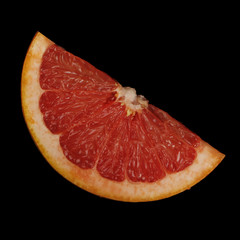 grapegruit slice on black background isolated