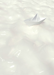 Paper boat sails in the white milk river. 