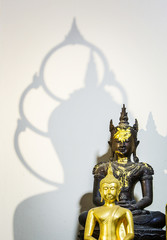 Two Buddhas and Budda shadows, double exposure, peaceful mind concept