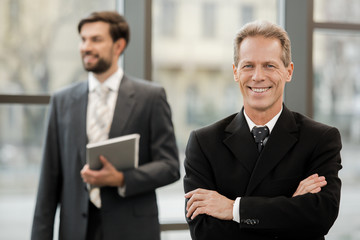 Fototapeta premium Stylish businessmen working in office