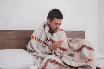 Sick young man fever concept