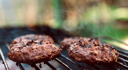 Juicy burger cutlets for burger are grilled