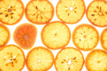 Mandarin citrus fruit slices on white