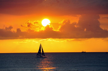 Fototapeta na wymiar Sailing at Sundown