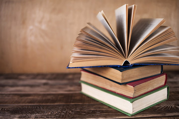 Books on the wooden table, old books