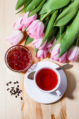 morning tea, fruit jelly, tullips on the table 