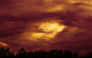 red sunset Fantasy sky, thick clouds before the rain