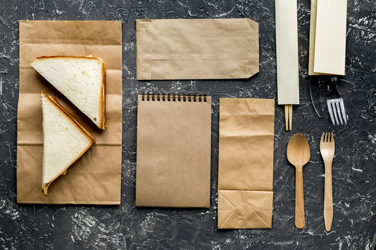 Take away set with paper bags restourant table background top view mockup