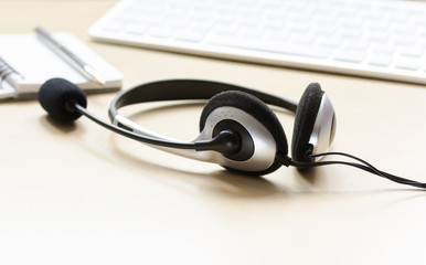call center manager work desk with headset