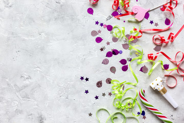 birthday party set with confetti on stone background top view mock up