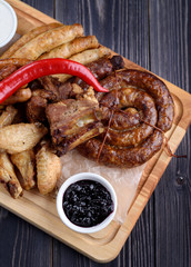 Grilled sausages and chicken